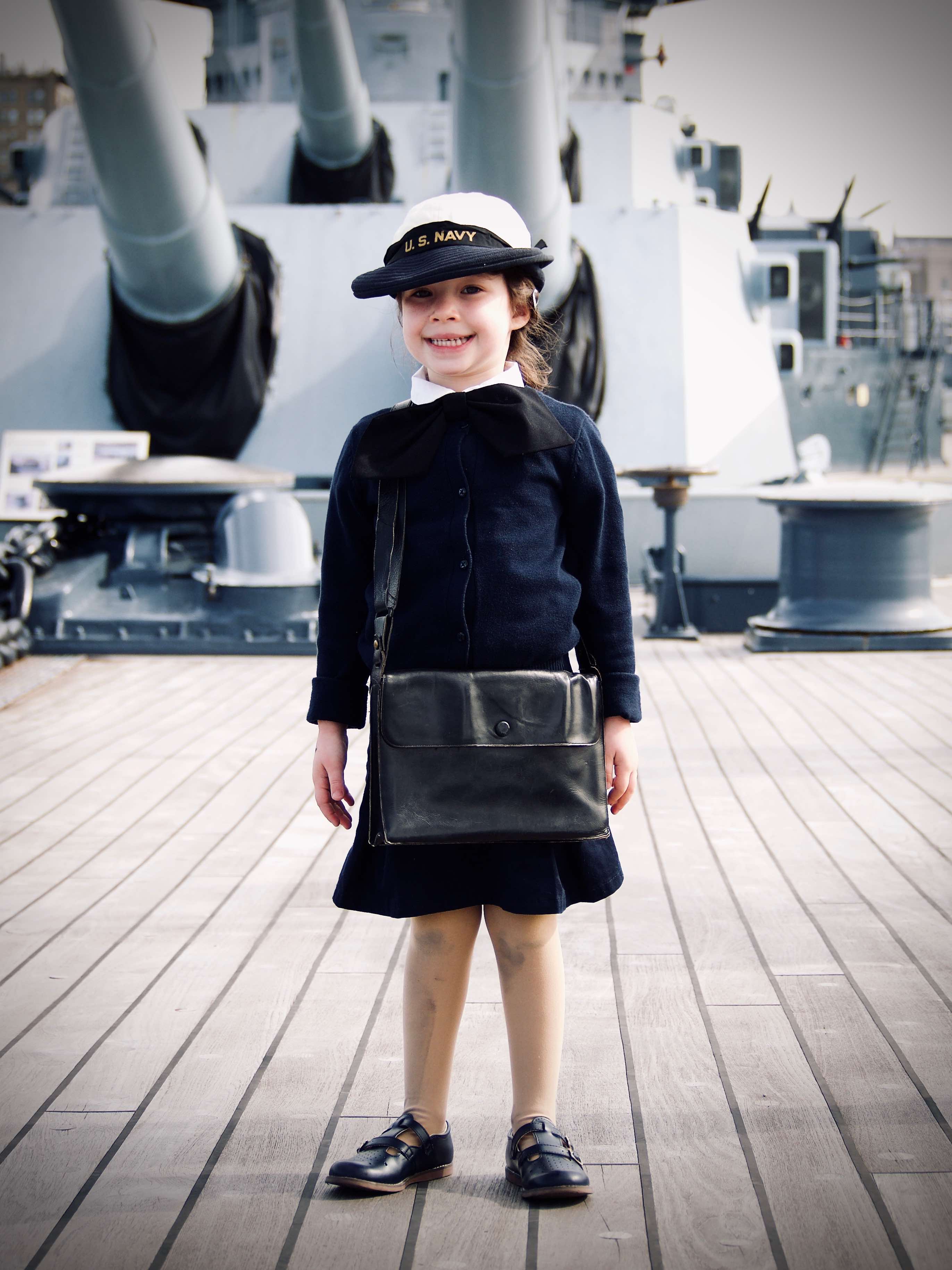 Little girl on battleship